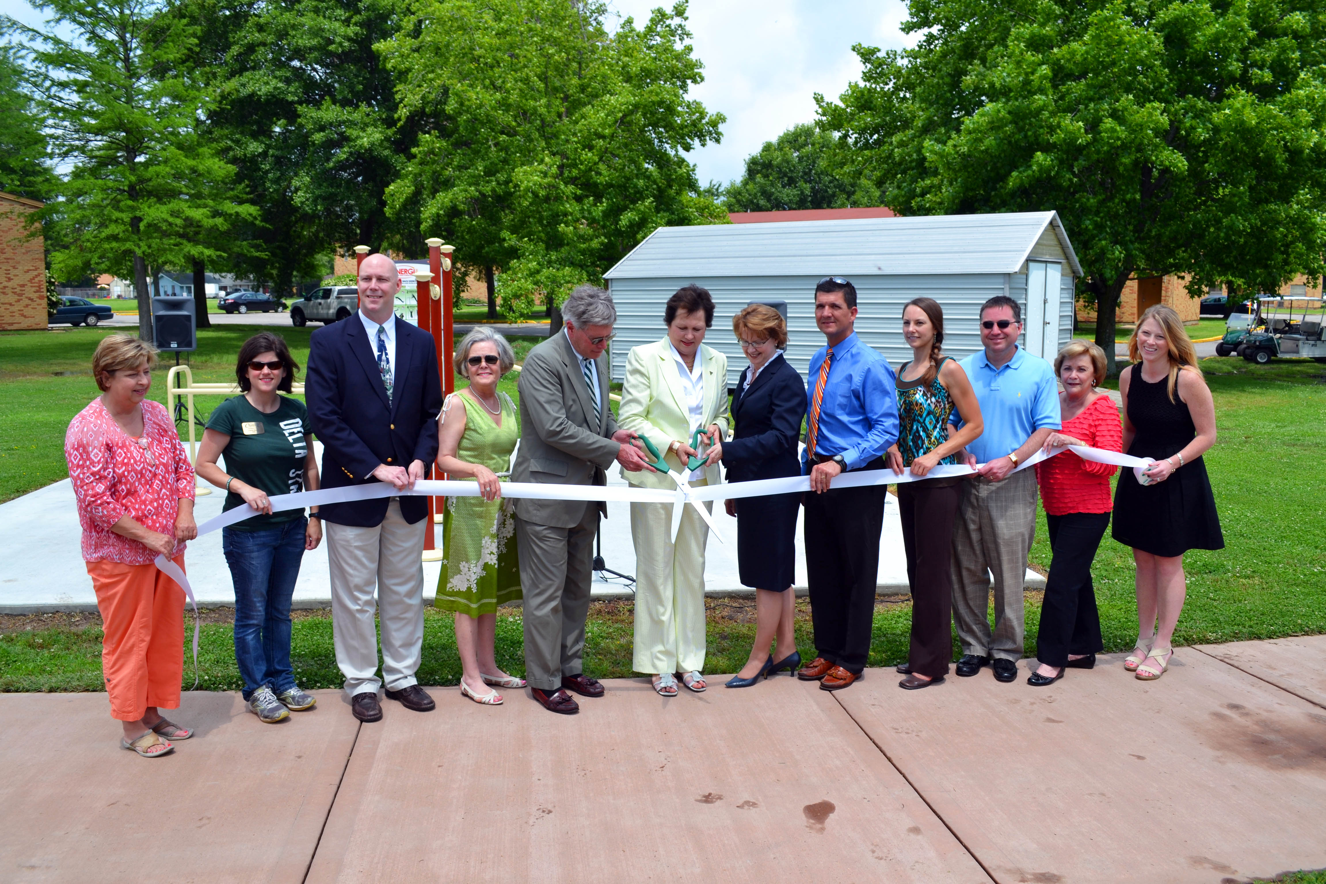 PHOTO:  Delta State University installs new exercise stations to its outdoor recreation facility. Pictured left to right are: Diane Makamson, Christy Riddle, Tim Colbert, Ann Lotven, William LaForge, Leslie Griffin, Sheila Grogan, Doug Pinkerton, Krista Davis, Rob Turner, Cynthia Petersen, and Suzette Matthews. 